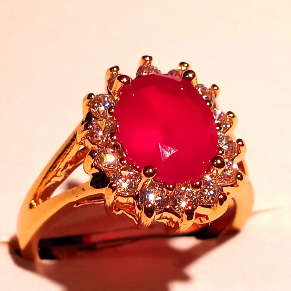 Natural ruby oval cut in 10K yellow gold filled.